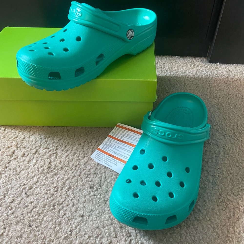 Blue teal crocs size 9 brand new never worn